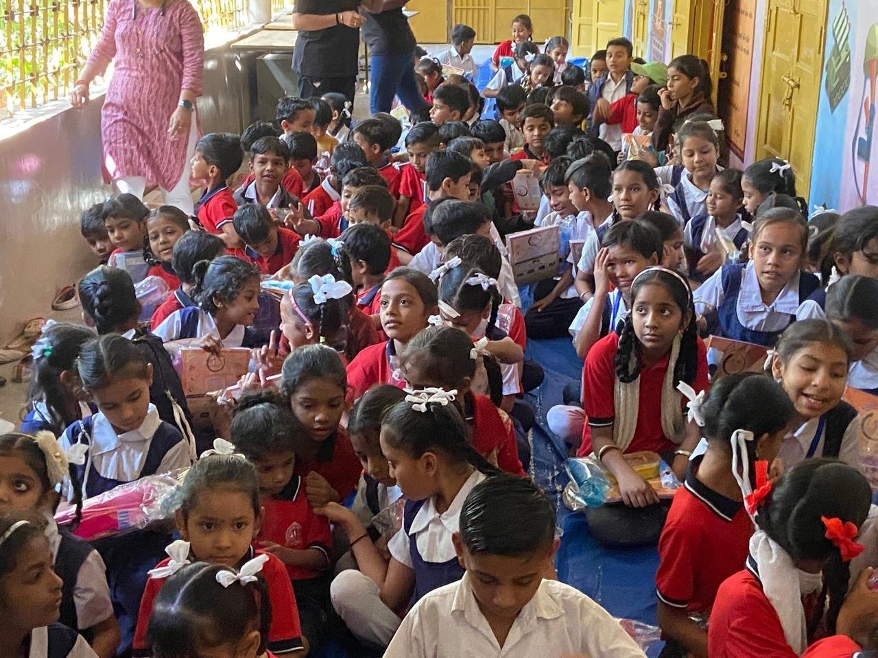 Children with stationery sets