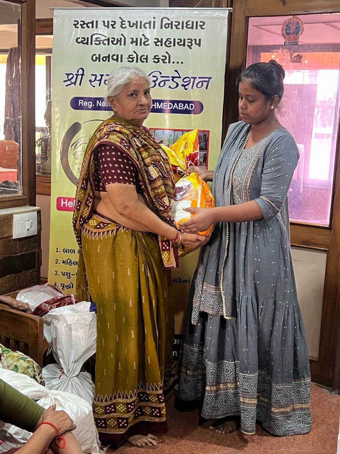 Monthly ration handover &mdash; Elder Care & Ration
